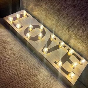 Love sign decoration made of wood